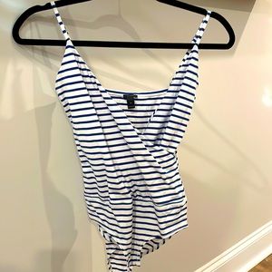 Blue and white bodysuit